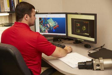 Engineer using CAD modeling software